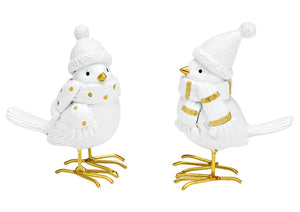 Pareja de pájaros blanco y dorado.